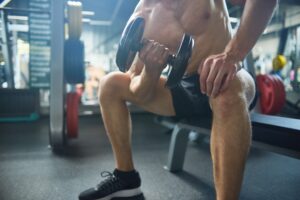 Flexing Muscles with Dumbbells
